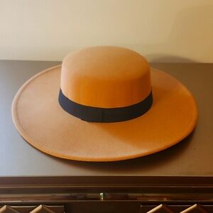 Camel bolero brim hat with black ribbon